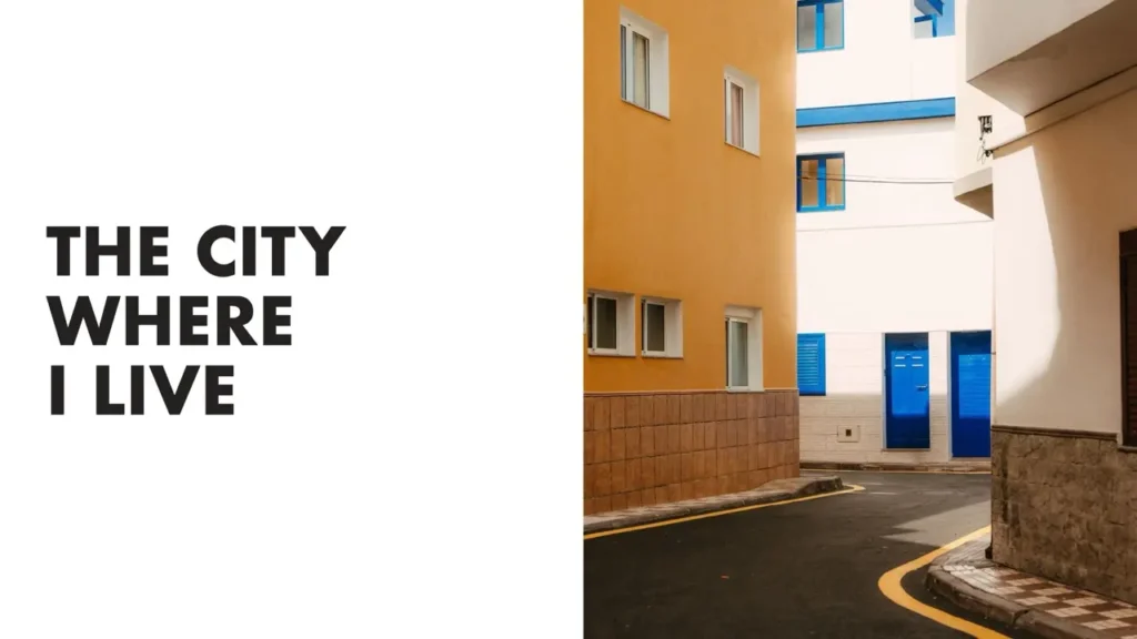 An ESL lesson cover titled “The City Where I Live” from betterclass, created for A2 (Pre-Intermediate) English learners. The image shows colorful apartment buildings with bright yellow, white, and blue accents, symbolizing urban life and everyday surroundings. This lesson helps students describe their city, neighborhood, and daily environment using practical English vocabulary and grammar, making it ideal for beginner-level speaking and writing practice.