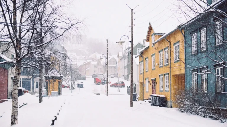 A snowy street with historic buildings showing winter weather esl lesson contextual imagery for A2 learners