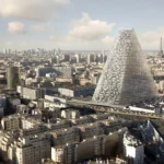 A aerial view of Tour Triangle, a glass pyramid skyscraper rising above the Paris skyline, with the Eiffel Tower visible behind it.